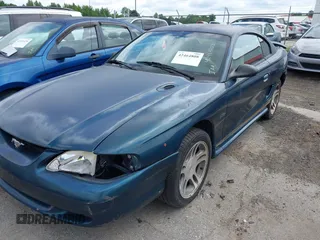 1996 Ford Mustang GT z VIN 1FALP42XXTF137304, wystawiony jako IAAI lot #42464808 z przebiegiem 166 565 mil mil oraz . Historia ofert i sprzedaży dostępna na DreamBid. Obrazek 2.
