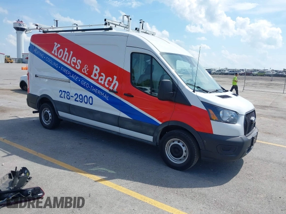 2023 Ford Transit Cargo with VIN 1FTBR1C80PKA43077, listed as a IAAI auction lot 40182475 with 15,656 mi miles and . Bid and sale history available at DreamBid. Image 1.