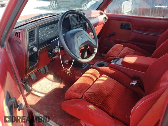 1989 Ford Ranger Splash with VIN 1FTCR10A2KUB58322, listed as a Copart auction lot 77710394 with 890,534 mi miles and Salvage Title. Bid and sale history available at DreamBid. Image 8.