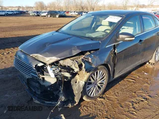 2015 Ford Focus Titanium with VIN 1FADP3J28FL348625, listed as a IAAI auction lot 41674741 with 223,585 mi miles and . Bid and sale history available at carsss.com. Image 6.