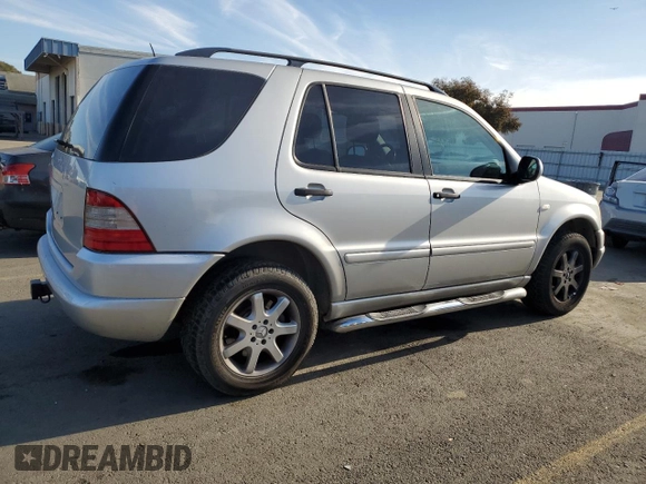 2000 Mercedes-Benz M 320/430/500 with VIN 4JGAB72E2YA185234, listed as a Copart auction lot 83479684 with 209,491 mi miles and Clean title. Bid and sale history available at DreamBid. Image 3.