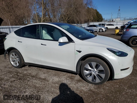 2023 Tesla Model Y Long Range z VIN 7SAYGAEE2PF758235, wystawiony jako Copart lot #49059895 z przebiegiem 57 615 mil mil oraz Czysty tytuł • Clean title. Historia ofert i sprzedaży dostępna na DreamBid. Obrazek 4.