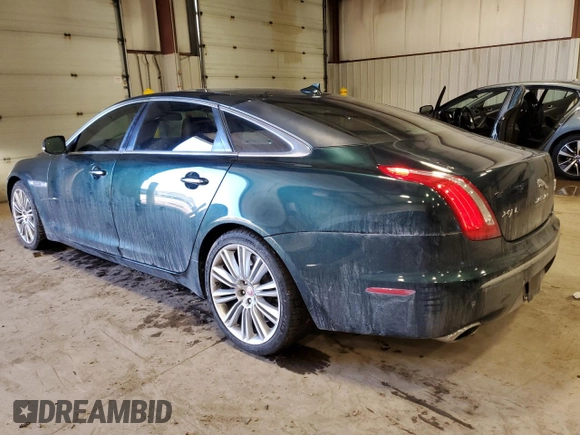 2014 Jaguar XJ with VIN SAJWA2GTXEMV72147, listed as a Copart auction lot 44854485 with 103,814 mi miles and Salvage Title. Bid and sale history available at DreamBid. Image 2.