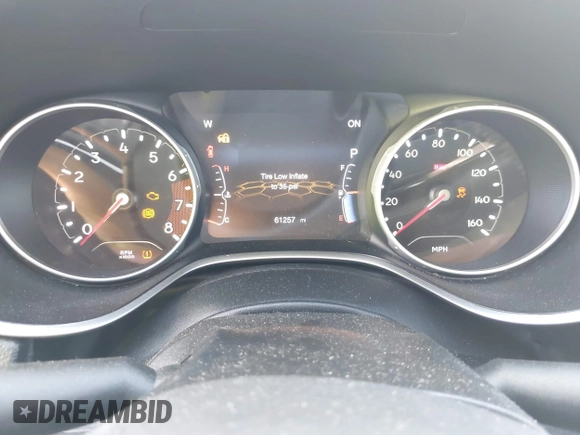 2021 Jeep Compass Latitude z VIN 3C4NJDBB5MT603608, wystawiony jako IAAI lot #40036775 z przebiegiem 61 257 mil mil oraz . Historia ofert i sprzedaży dostępna na DreamBid. Obrazek 7.