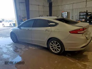 2017 Ford Fusion SE with VIN 3FA6P0HDXHR380057, listed as a Copart auction lot 59583425 with 115,038 mi miles and Salvage title. Bid and sale history available at DreamBid. Image 2.
