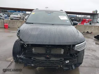 2023 Volkswagen Tiguan SE R-Line Black with VIN 3VVCB7AX0PM061742, listed as a IAAI auction lot 41528630 with 22,571 mi miles. Bid and sale history available at carsss.com. Image 13.