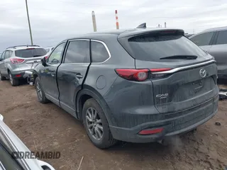 2018 Mazda CX-9 Touring with VIN JM3TCBCY3J0212479, listed as a IAAI auction lot 41737024 with 128,552 mi miles and . Bid and sale history available at DreamBid. Image 3.