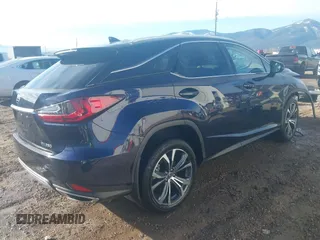 2022 Lexus RX 350 with VIN 2T2HZMDA9NC344583, listed as a IAAI auction lot 41878741 with 27,946 mi miles and . Bid and sale history available at DreamBid. Image 4.