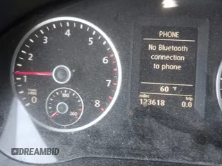 2012 Volkswagen Tiguan SE with VIN WVGAV7AX5CW000275, listed as a IAAI auction lot 41789246 with 123,618 mi miles and . Bid and sale history available at DreamBid. Image 7.