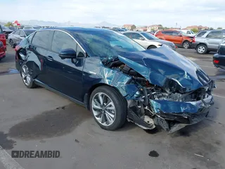 2018 Honda Clarity Touring z VIN JHMZC5F36JC012648, wystawiony jako IAAI lot #42185722 z przebiegiem 20 557 mil mil oraz . Historia ofert i sprzedaży dostępna na DreamBid. Obrazek 1.