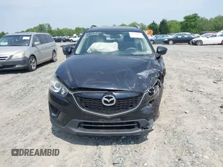 2014 Mazda CX-5 Sport with VIN JM3KE2BE3E0405976, listed as a IAAI auction lot 42161069 with 66,301 mi miles and . Bid and sale history available at carsss.com. Image 12.