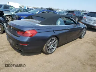 2012 BMW 6 Series 650i z VIN WBALZ3C57CDL71551, wystawiony jako Copart lot #54622705 z przebiegiem Nie podano mil oraz Szkody całkowita. Historia ofert i sprzedaży dostępna na DreamBid. Obrazek 3.