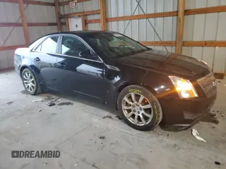 2009 Cadillac CTS RWD с VIN 1G6DF577590169740, выставлен на аукционе Copart как лот 57041055 с пробегом 68 857 миль миль и Списание • Salvage title. История ставок и продаж доступна на DreamBid. Изображение 4.