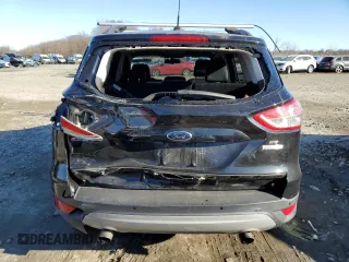 2014 Ford Escape SE with VIN 1FMCU0GXXEUC49700, listed as a Copart auction lot 46371155 with 142,541 mi miles and Salvage Title. Bid and sale history available at DreamBid. Image 6.