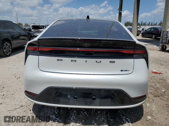 2024 Toyota Prius LE with VIN JTDACAAU5R3031775, listed as a Copart auction lot 52430075 with 9,957 mi miles and Non Repairable. Bid and sale history available at DreamBid. Image 6.