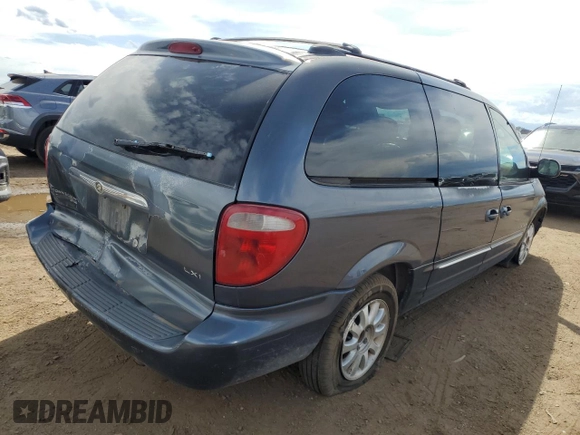2001 Chrysler Town & Country LXi with VIN 2C4GP54L11R176042, listed as a Copart auction lot 69045254 with 217,421 mi miles and Salvage Title. Bid and sale history available at DreamBid. Image 3.