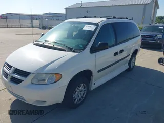 2005 Dodge Caravan SE z VIN 1D4GP24R85B272194, wystawiony jako IAAI lot #42555446 z przebiegiem 93 402 mil mil oraz . Historia ofert i sprzedaży dostępna na DreamBid. Obrazek 2.