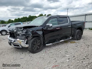 2019 Chevrolet Silverado 1500 LTZ with VIN 1GCUYGEL7KZ124884, listed as a Copart auction lot 58082934 with 124,904 mi miles and Salvage Title. Bid and sale history available at carsss.com. Image 1.