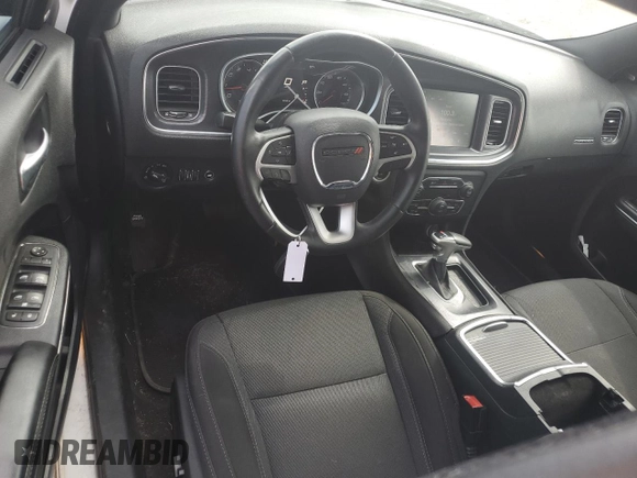 2015 Dodge Charger SXT with VIN 2C3CDXHGXFH865725, listed as a Copart auction lot 54217975 with 147,494 mi miles and Salvage Title. Bid and sale history available at DreamBid. Image 8.