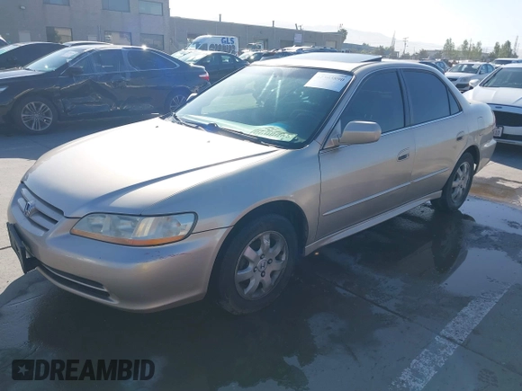2001 Honda Accord EX z VIN JHMCG66801C010759, wystawiony jako IAAI lot #42303890 z przebiegiem 216 143 mil mil oraz . Historia ofert i sprzedaży dostępna na DreamBid. Obrazek 17.