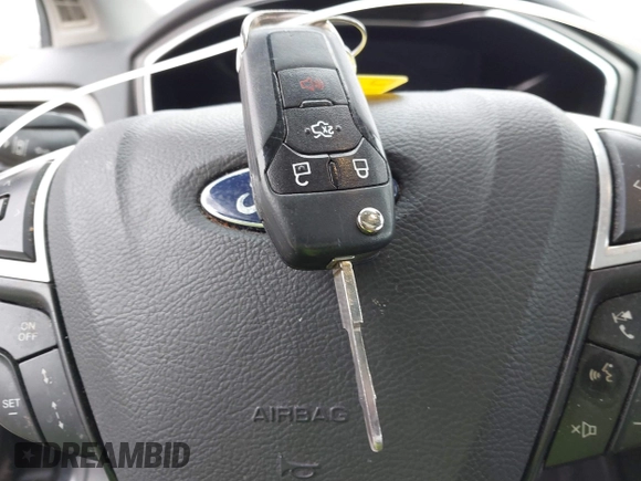 2014 Ford Fusion SE Hybrid with VIN 3FA6P0LU2ER133294, listed as a IAAI auction lot 41696064 with 150,537 mi miles. Bid and sale history available at carsss.com. Image 11.
