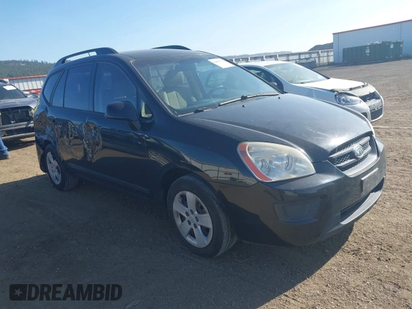 2009 Kia Rondo LX with VIN KNAFG529797268303, listed as a IAAI auction lot 42088100 with 140,458 mi miles. Bid and sale history available at carsss.com. Image 1.