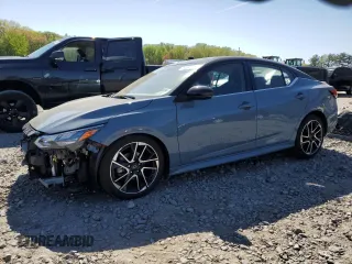 2024 Nissan Sentra SR z VIN 3N1AB8DV0RY308276, wystawiony jako Copart lot #54685265 z przebiegiem 6 030 mil mil oraz Szkoda całkowita • Salvage title. Historia ofert i sprzedaży dostępna na DreamBid. Obrazek 1.