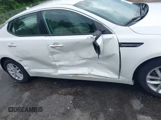 2013 Kia Optima LX z VIN KNAGM4A72D5366828, wystawiony jako IAAI lot #42106525 z przebiegiem 159 564 mil mil oraz . Historia ofert i sprzedaży dostępna na DreamBid. Obrazek 13.