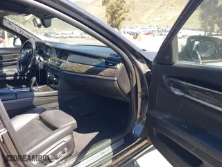 2013 BMW 7 Series 750i with VIN WBAYA8C50DD227951, listed as a IAAI auction lot 41842264 with 157,438 mi miles. Bid and sale history available at carsss.com. Image 5.
