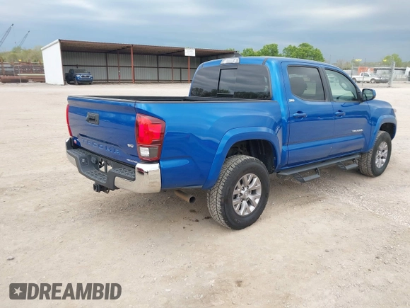2018 Toyota Tacoma SR5 with VIN 3TMAZ5CNXJM069212, listed as a IAAI auction lot 42010564 with 73,825 mi miles and . Bid and sale history available at DreamBid. Image 4.