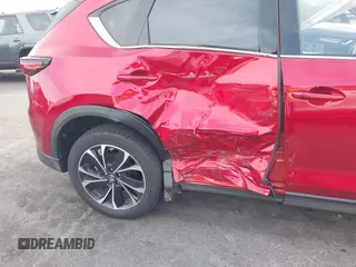 2023 Mazda CX-5 S Premium with VIN JM3KFBDM2P0130525, listed as a IAAI auction lot 41479518 with 18,145 mi miles and . Bid and sale history available at DreamBid. Image 6.