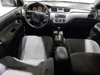 2004 Mitsubishi Lancer z VIN JA3AD29F44U024617, wystawiony jako Copart lot #51847765 z przebiegiem 172 585 mil mil oraz Szkoda całkowita • Salvage title. Historia ofert i sprzedaży dostępna na DreamBid. Obrazek 8.