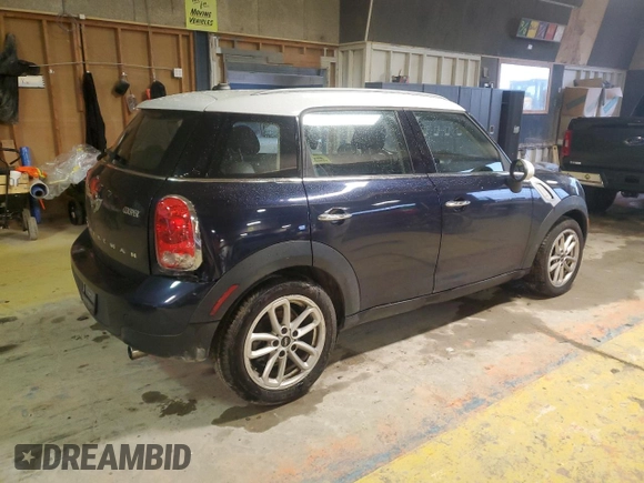 2015 MINI Countryman with VIN WMWZB3C53FWR43903, listed as a Copart auction lot 86384294 with 112,667 mi miles and Salvage Title. Bid and sale history available at DreamBid. Image 3.