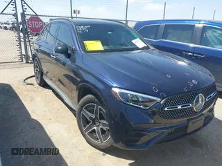 2023 Mercedes-Benz GLC 300 with VIN W1NKM4GB5PU029940, listed as a IAAI auction lot 42037479 with 13,574 mi miles and . Bid and sale history available at DreamBid. Image 1.