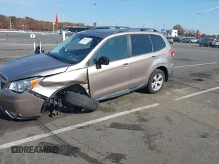 2015 Subaru Forester 2.5i Premium with VIN JF2SJADC4FH409078, listed as a IAAI auction lot 40731696 with 171,874 mi miles. Bid and sale history available at carsss.com. Image 18.