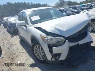 2013 Mazda CX-5 Touring with VIN JM3KE2CE0D0119032, listed as a IAAI auction lot 41891556 with 174,745 mi miles and . Bid and sale history available at carsss.com. Image 1.