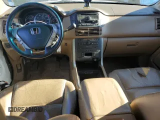 2005 Honda Pilot EX-L z VIN 5FNYF18525B064752, wystawiony jako Copart lot #56022115 z przebiegiem 221 161 mil mil oraz Szkoda całkowita • Salvage title. Historia ofert i sprzedaży dostępna na DreamBid. Obrazek 8.