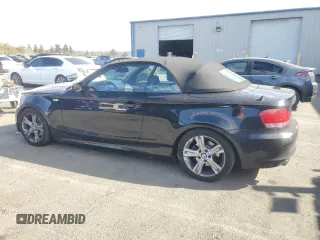 2009 BMW 1 Series 128i with VIN WBAUN13529VH81121, listed as a Copart auction lot 77849094 with 30,756 mi miles and Salvage Title. Bid and sale history available at DreamBid. Image 2.