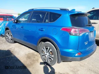 2016 Toyota RAV4 LE with VIN JTMBFREV2GD183811, listed as a IAAI auction lot 42216793 with 95,270 mi miles and . Bid and sale history available at DreamBid. Image 3.