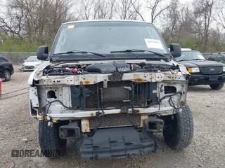 2012 Ford Econoline Cargo Commercial with VIN 1FTNE1EW0CDB10750, listed as a IAAI auction lot 41939696 with 180,042 mi miles. Bid and sale history available at carsss.com. Image 13.