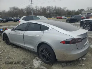 2013 Tesla Model S with VIN 5YJSA1AC9DFP10705, listed as a Copart auction lot 89394665 with Not Provided miles and Salvage Title. Bid and sale history available at carsss.com. Image 2.