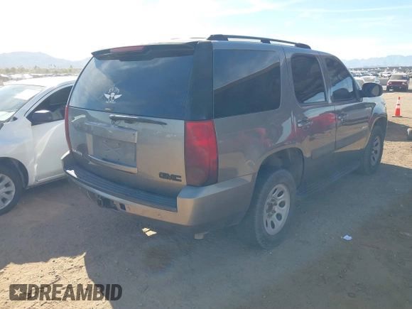2007 GMC Yukon SLT with VIN 1GKFC13J67J111074, listed as a IAAI auction lot 41459309 with 212,753 mi miles. Bid and sale history available at carsss.com. Image 4.