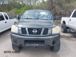 2011 Nissan Titan Pro-4X with VIN 1N6BA0EC3BN320795, listed as a IAAI auction lot 41868113 with 183,919 mi miles and . Bid and sale history available at DreamBid. Image 12.