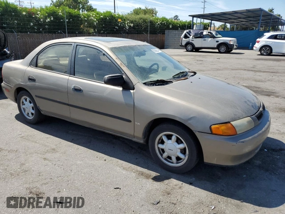 1998 Mazda Protege DX z VIN JM1BC1414W0203670, wystawiony jako Copart lot #62966544 z przebiegiem 249 405 mil mil oraz Szkoda całkowita • Salvage title. Historia ofert i sprzedaży dostępna na DreamBid. Obrazek 4.