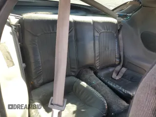 1994 Chevrolet Camaro z VIN 2G1FP22S1R2218727, wystawiony jako Copart lot #80922944 z przebiegiem 181 616 mil mil oraz Szkoda całkowita • Salvage title. Historia ofert i sprzedaży dostępna na DreamBid. Obrazek 10.