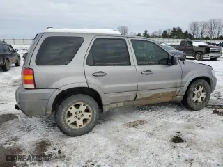 2007 Ford Escape Limited with VIN 1FMCU04157KA35034, listed as a Copart auction lot 86177794 with 215,888 mi miles and Salvage Title. Bid and sale history available at carsss.com. Image 3.