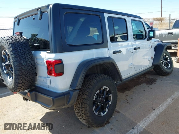 2025 Jeep Wrangler Rubicon with VIN 1C4PJXFN8SW527131, listed as a IAAI auction lot 41502676 with 1,051 mi miles and . Bid and sale history available at DreamBid. Image 4.
