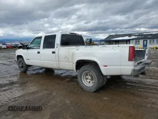 1999 Chevrolet Silverado 3500 z VIN 1GCHC33J2XF087634, wystawiony jako Copart lot #58106714 z przebiegiem 205 431 mil mil oraz Czysty tytuł • Clean title. Historia ofert i sprzedaży dostępna na DreamBid. Obrazek 2.