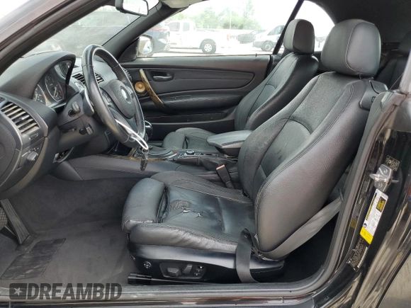 2011 BMW 1 Series 128i with VIN WBAUN1C55BVH83063, listed as a Copart auction lot 62858125 with Not provided miles and Clean title. Bid and sale history available at DreamBid. Image 7.