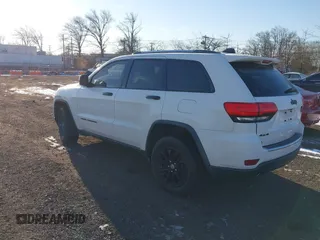 2014 Jeep Grand Cherokee Limited with VIN 1C4RJFBG7EC220677, listed as a IAAI auction lot 41177354 with 148,445 mi miles and . Bid and sale history available at DreamBid. Image 3.